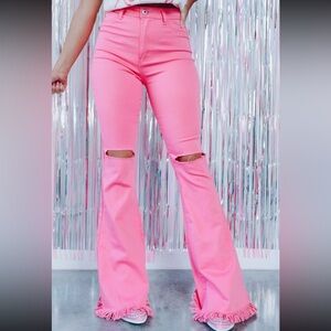 Vibrant Pink Flare Jeans with Fringe Hem